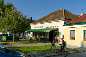 Bildvergleich - Kaufhaus Schöberl 2012 mit Konsum